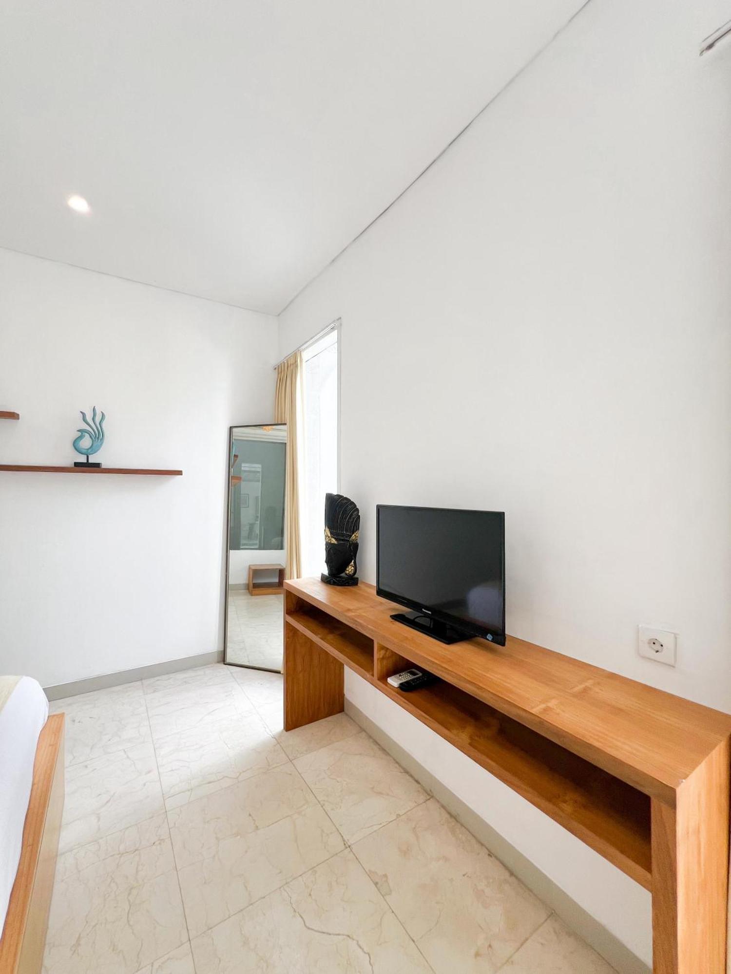 แอปเปิ้ลวิลลาแอนด์อพาร์ตเมนท์ Hotel เกอโรโบกัน ภายนอก รูปภาพ